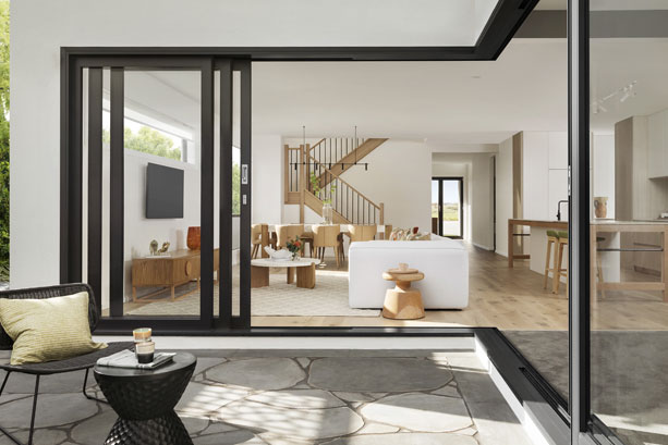 Outdoor entertaining with architectural windows